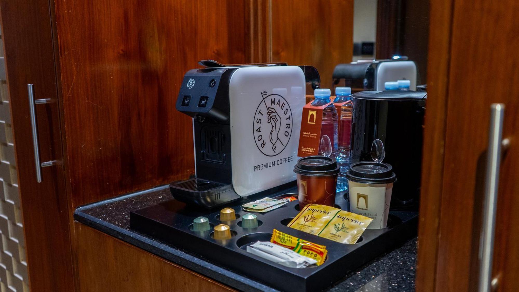 Al Safwah Hotel First Tower 1 Mecca Luaran gambar A Nespresso coffee machine